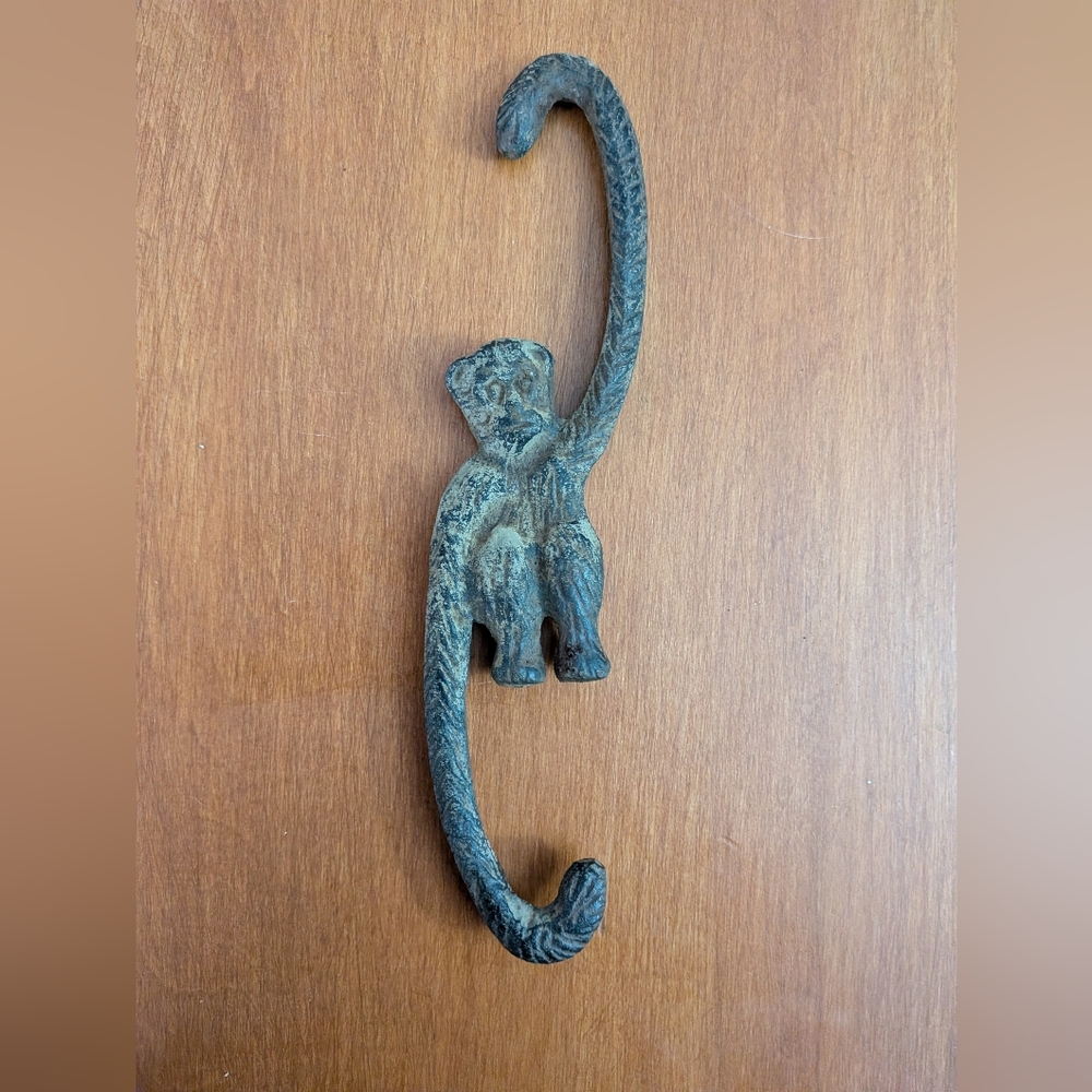 Antique Monkey Plant Hanger. Cast Iron